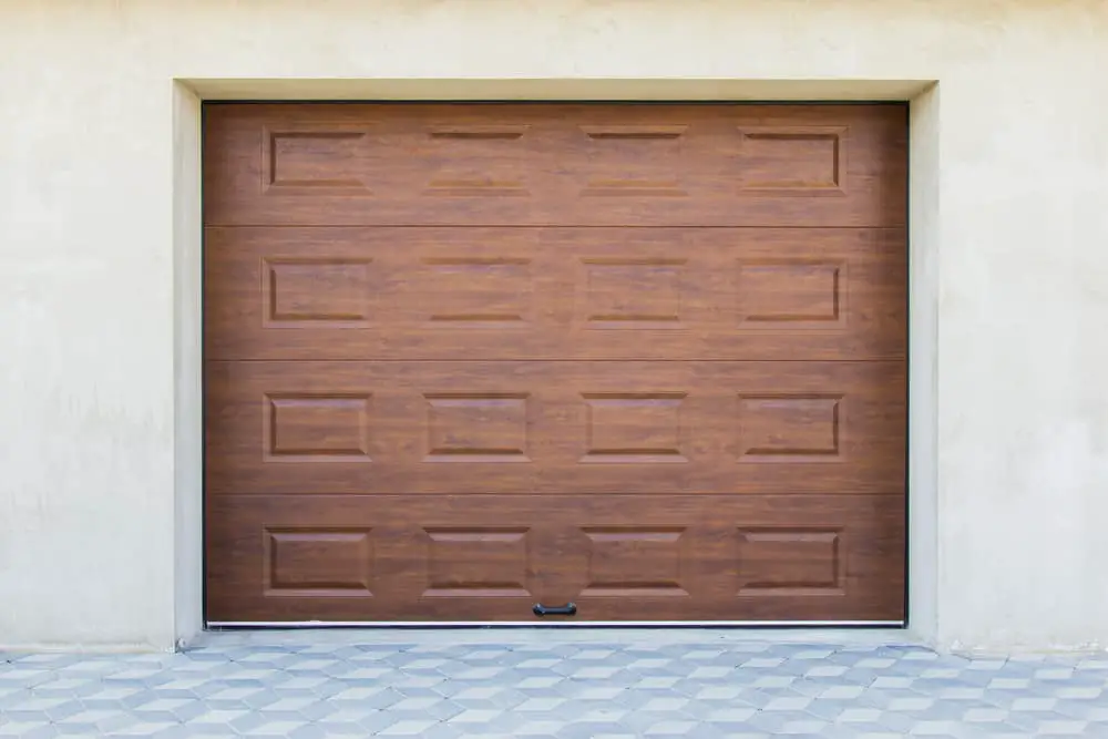 How Can You Keep a Garage Door from Sticking to A Concrete Floor?