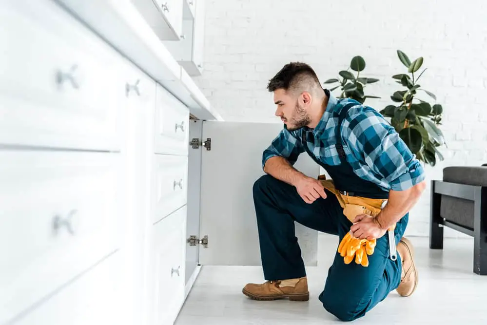 Should You Caulk Kitchen Cabinets Before or After Painting?